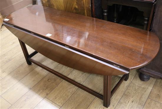 A drop leaf coffee table, W.152cm
